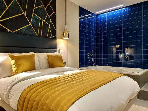 Suite exclusiva con jacuzzi del hotel NOX Maida Vale. Foto 1