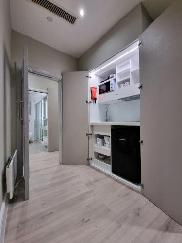 Suite exclusiva con jacuzzi del hotel NOX Maida Vale. Foto 10