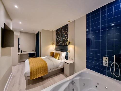 Suite exclusiva con jacuzzi del hotel NOX Maida Vale. Foto 11