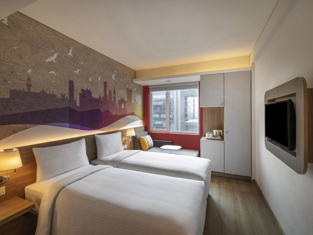 Habitación estándar con 2 camas individuales del hotel Ibis Mumbai Vikhroli. Foto 5