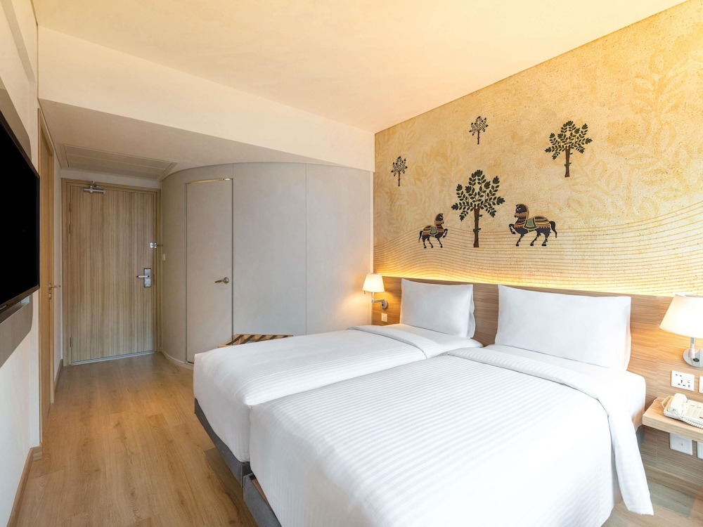 Habitación estándar con 2 camas individuales del hotel Ibis Mumbai Vikhroli. Foto 6