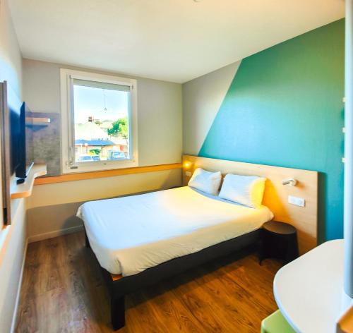 Doble - Habitación con cama grande del hotel Ibis Budget Rodez. Foto 4