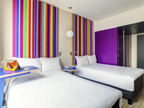 Habitación Doble Estándar - 2 camas del hotel Ibis Styles Mexico Reforma. Foto 1