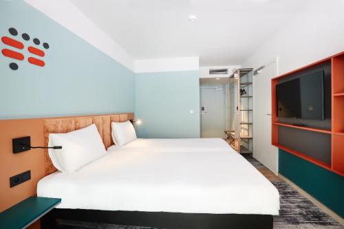 Habitación Doble Estándar - 2 camas del hotel Ibis Styles Kraków Centrum. Foto 9