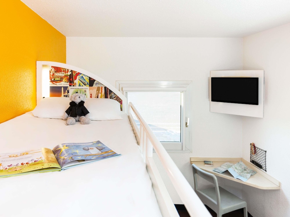 Habitación Break con 2 camas individuales y 1 cama alta para hasta 3 huéspedes del hotel F1 Le Havre Est - Gonfreville