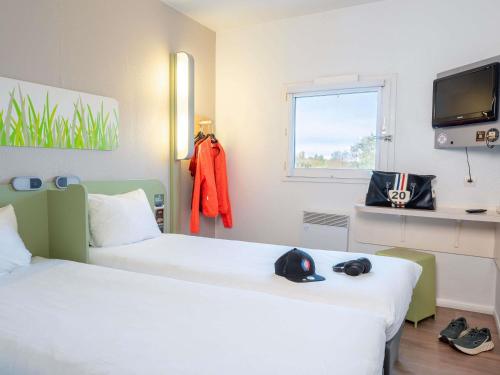 GEMELA - habitación con dos camas individuales para hasta 2 personas del hotel Ibis Budget Rouen Parc Des Expos Zenith
