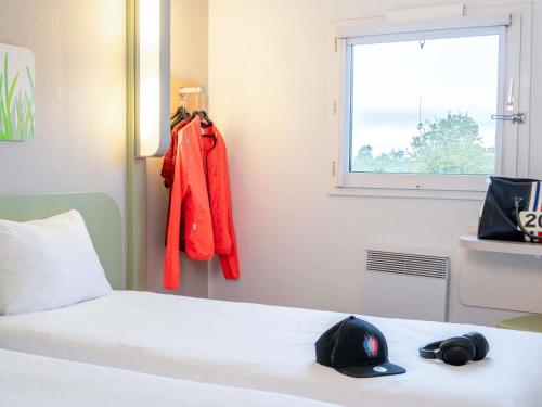 GEMELA - habitación con dos camas individuales para hasta 2 personas del hotel Ibis Budget Rouen Parc Des Expos Zenith. Foto 5