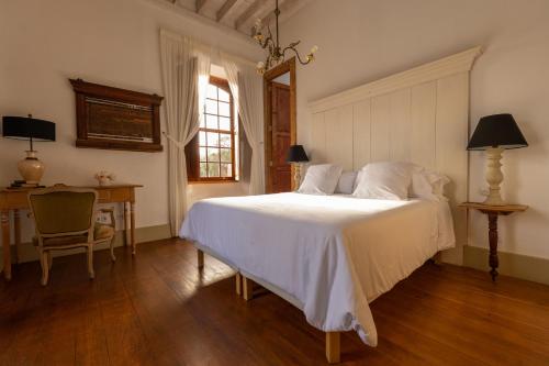 Habitación Doble con terraza del hotel La Casa De Los Naranjos. Foto 2