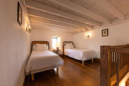 Habitación Cuádruple Clásica del hotel La Casa De Los Naranjos. Foto 1