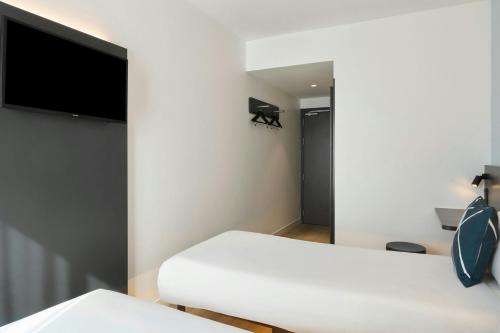 Habitación Doble Estándar - 2 camas del hotel Four Points Flex by Sheraton Madrid Atocha. Foto 3