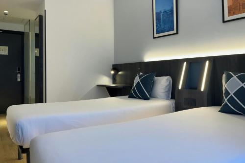 Habitación Doble Estándar - 2 camas del hotel Four Points Flex by Sheraton Madrid Atocha. Foto 5