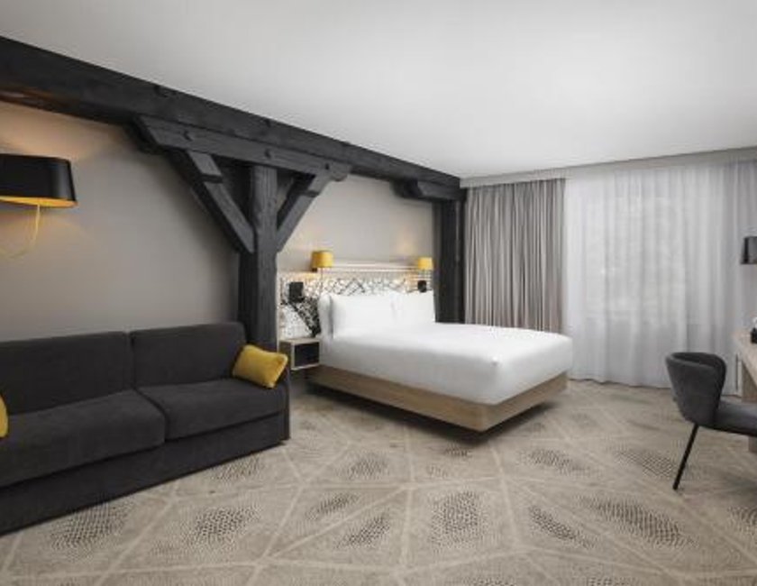 Habitación Doble Deluxe con sofá cama del hotel Hilton Garden Inn Paris La Villette. Foto 1