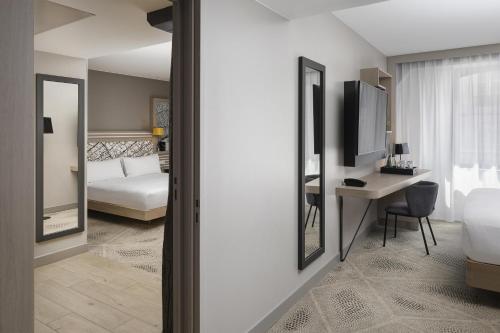 Habitaciones Comunicadas Familiares del hotel Hilton Garden Inn Paris La Villette. Foto 2