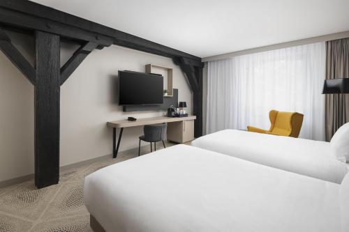 Habitación Doble Deluxe - 2 camas del hotel Hilton Garden Inn Paris La Villette. Foto 1