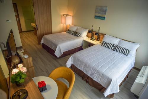 Habitación adaptada para personas de movilidad reducida - 2 camas grandes - No fumadores del hotel Wyndham Garden North Bergen Near Secaucus. Foto 3