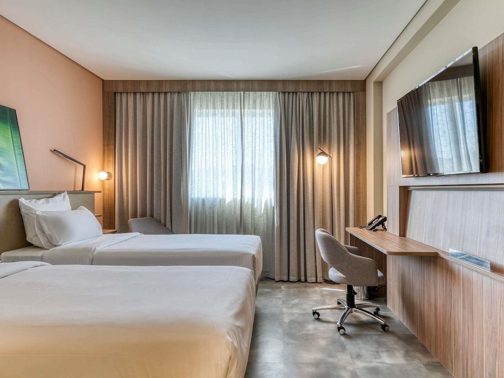 Habitación Executive con 2 camas individuales del hotel Novotel Belo Horizonte Savassi. Foto 1