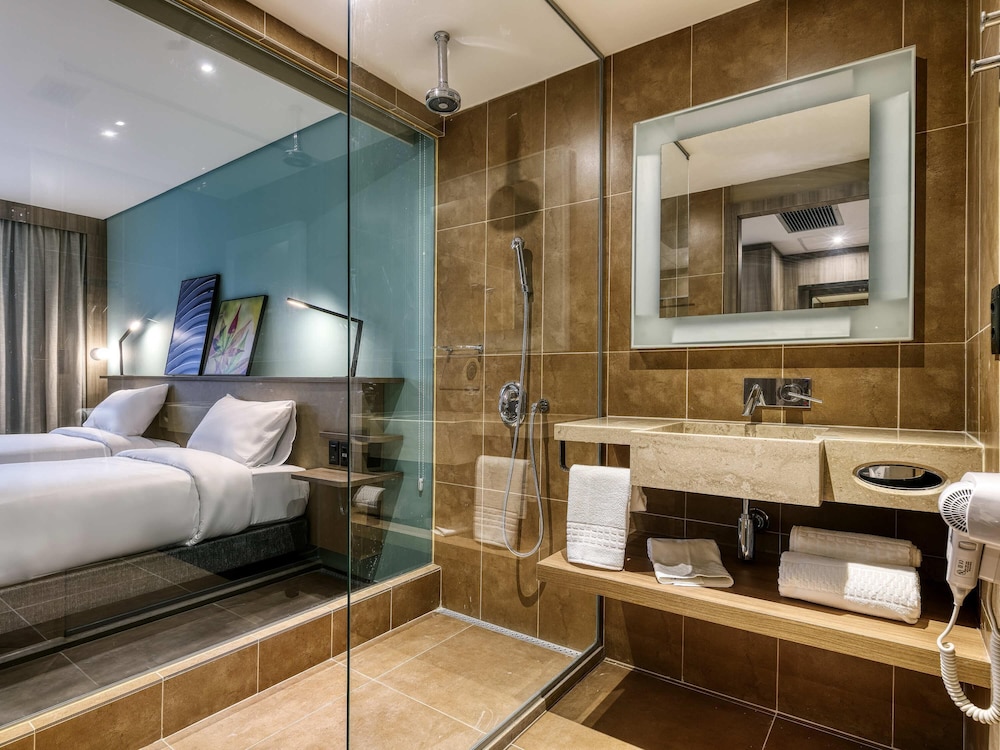 Habitación superior con 2 camas individuales del hotel Novotel Belo Horizonte Savassi. Foto 5