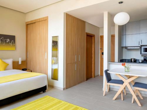 Estudio con 1 cama King Size del hotel Adagio Doha. Foto 2