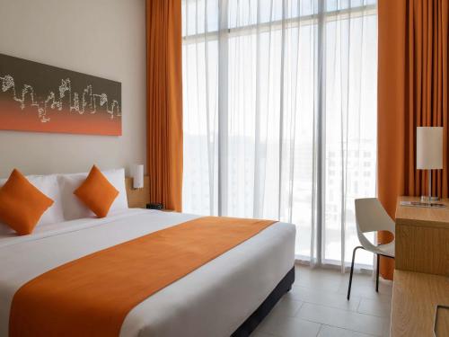 Apartamento de un dormitorio, 1 cama King Size y 1 sofá - cama individual del hotel Adagio Doha