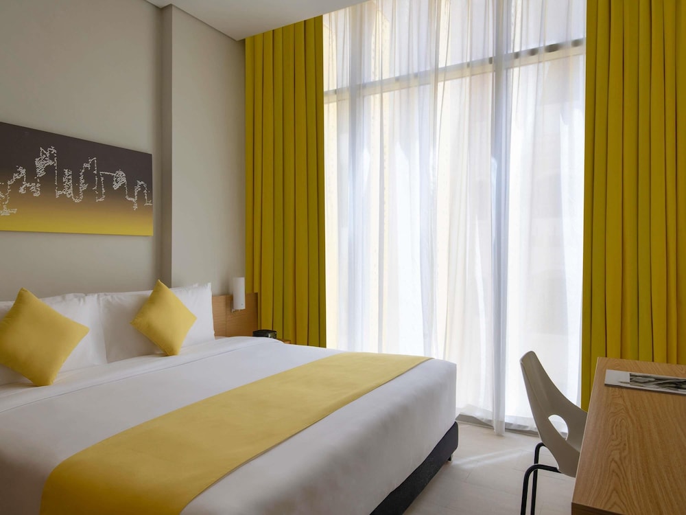 Apartamento de dos dormitorios, 2 camas King Size y 1 sofá - cama individual del hotel Adagio Doha