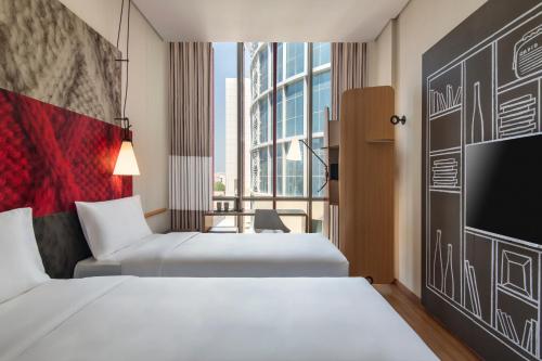 Suite Familiar Conectada del hotel Ibis Doha. Foto 3