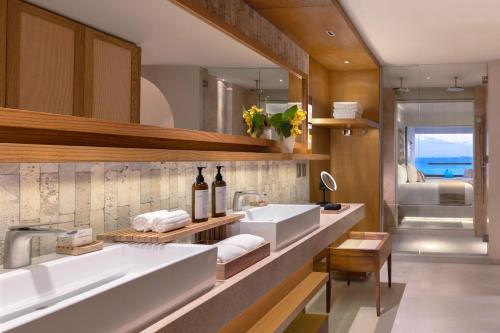 Suite Junior Signature con bañera de hidromasaje - Frente al mar del hotel Impression Isla Mujeres by Secrets – Adults only – All Inclusive. Foto 1