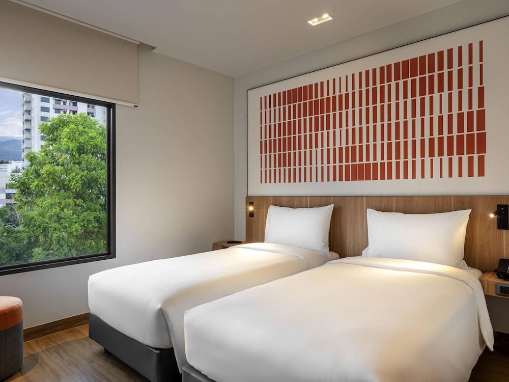 Habitación Estándar con Dos Camas Individuales, Lado de la Montaña del hotel Ibis Chiang Mai Nimman Journeyhub. Foto 1