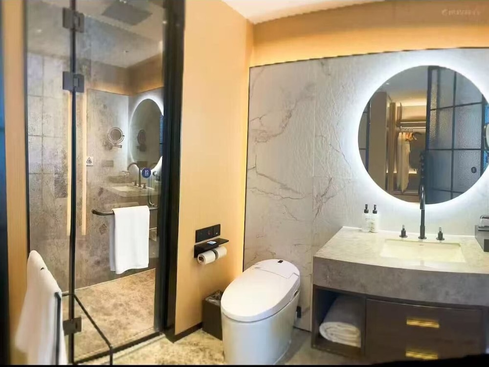 Habitación estándar con dos camas individuales del hotel Novotel Tianjin Drum Tower. Foto 3