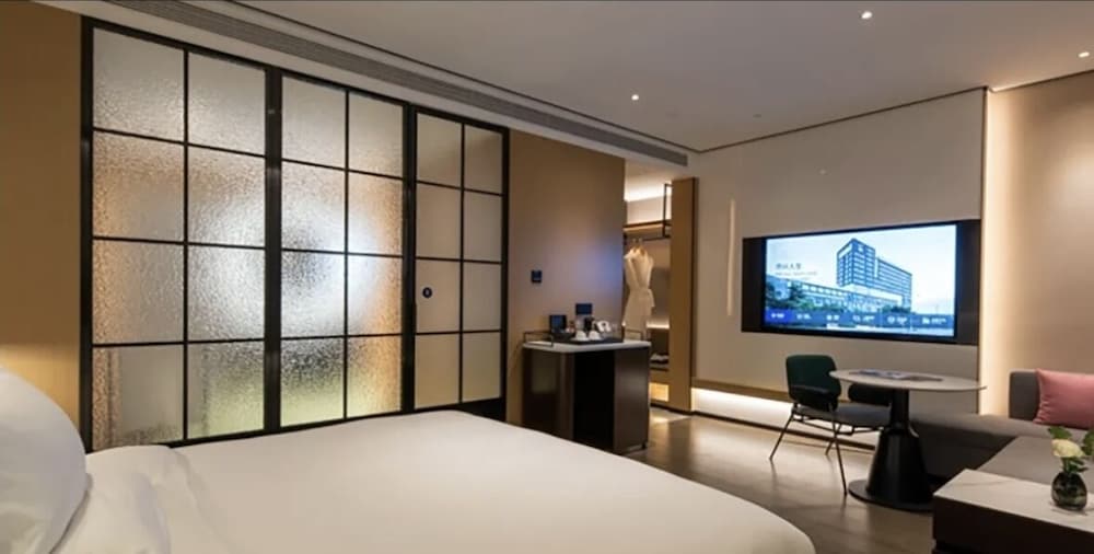HABITACIÓN SUPERIOR, Una Cama King Size del hotel Novotel Tianjin Drum Tower. Foto 2