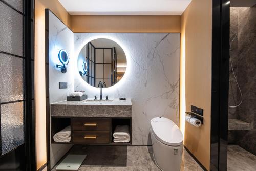 HABITACIÓN DE LUJO, dos camas gemelas del hotel Novotel Tianjin Drum Tower. Foto 1