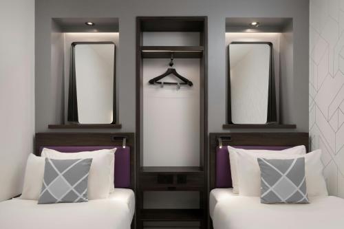 Habitación doble sin ventana 2 Camas individuales del hotel Four Points Flex by Sheraton London Shoreditch East. Foto 6