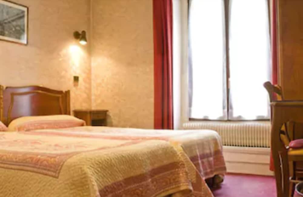 Habitación estándar con 2 camas individuales del hotel Cluny Sorbonne. Foto 2