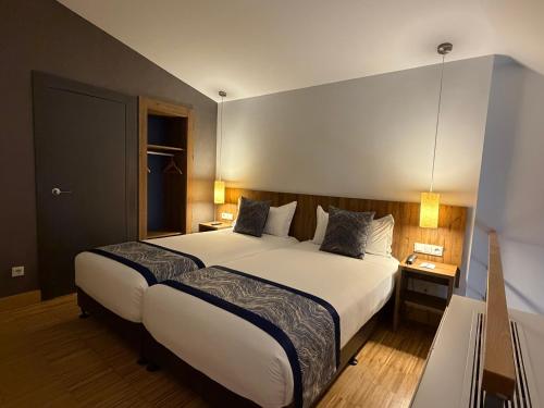 Habitación Dúplex del hotel Villa Odón. Foto 1