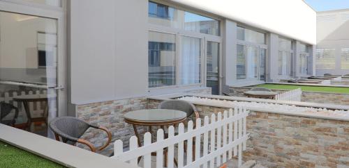 Habitación Doble con Terraza del hotel Villa Odón. Foto 5