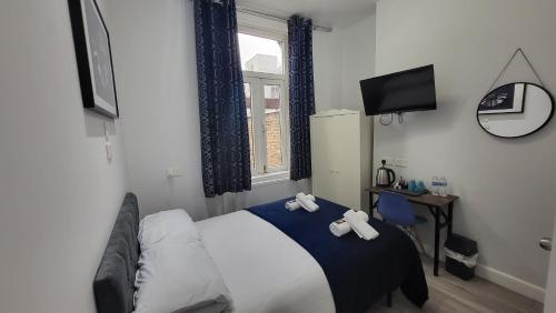 Habitación Doble con baño privado del hotel Argyle Square. Foto 20