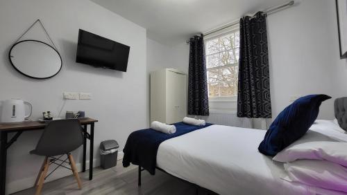Habitación Doble con baño privado del hotel Argyle Square. Foto 23