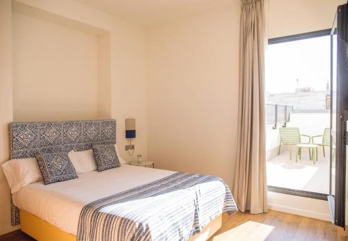 Apartamento con terraza del hotel nQn Aparts and Suites Sevilla. Foto 4