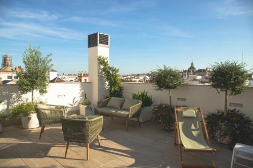 Apartamento con balcón del hotel nQn Aparts and Suites Sevilla. Foto 6
