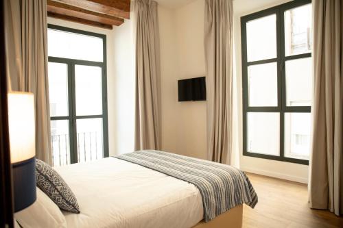 Apartamento con balcón del hotel nQn Aparts and Suites Sevilla. Foto 9