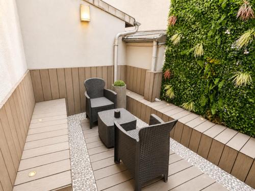 Habitación Doble Deluxe con terraza del hotel L'adresse. Foto 4