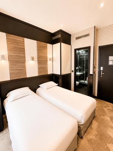 Habitación Doble - 2 camas del hotel L'adresse. Foto 4