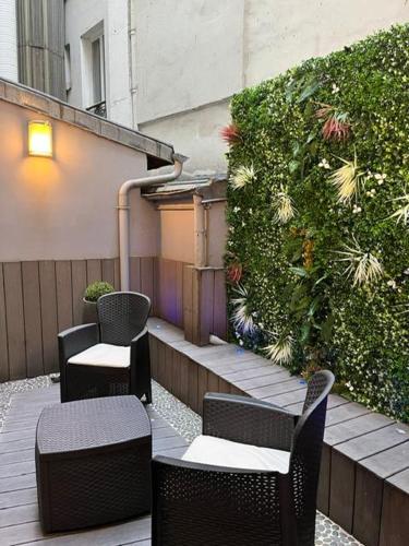 Habitación Doble Deluxe con terraza del hotel L'adresse. Foto 4