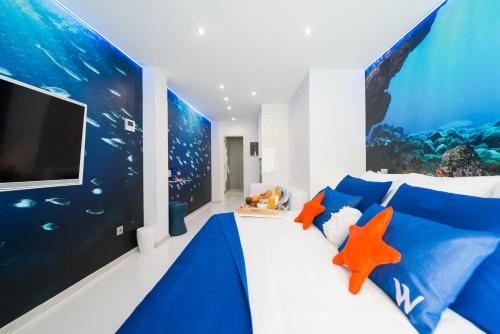 Habitación Doble con balcón y vistas parciales al mar del hotel Wavia - Adults Only. Foto 3