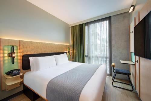 King Room with City View - Communication Assistance del hotel Moxy Brooklyn Williamsburg. Foto 1