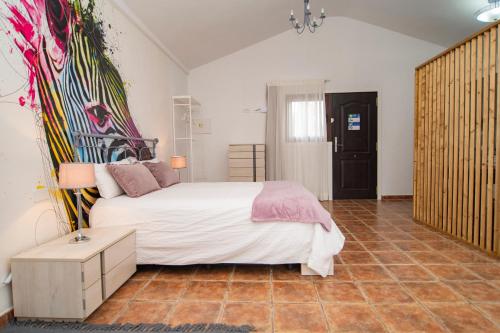 Habitación Doble Superior con vistas al jardín del hotel Finca El Pastel. Foto 10