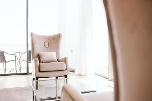 Suite Premium con vistas al mar del hotel Vila Baleira Funchal. Foto 1