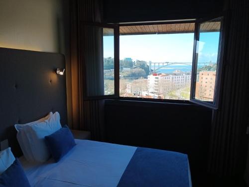 Habitación Doble Deluxe con vistas al mar - 1 o 2 camas del hotel Vilar Oporto. Foto 2