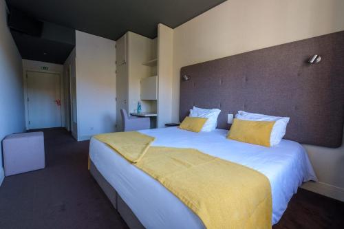 Habitación Doble Deluxe - 1 o 2 camas del hotel Vilar Oporto. Foto 6
