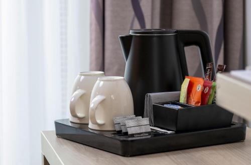 Habitación con cama grande y ducha a ras de suelo - adaptada para personas de movilidad reducida - No fumadores del hotel Best Western Plus Koeln City. Foto 2