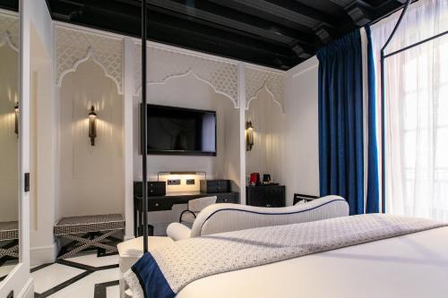 Habitación Doble Deluxe - 1 o 2 camas del hotel Casa Palacio Don Ramón. Foto 9